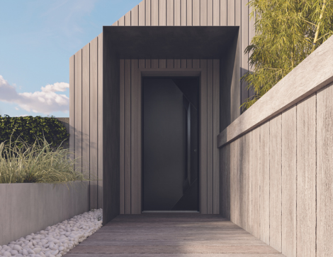 porte d'entrée alu sur une façade de maison contemporaine en bois