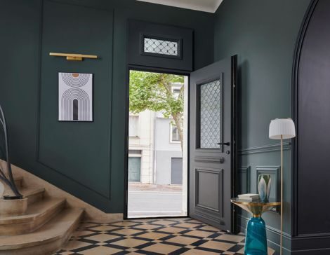intérieur d'une maison avec une porte d'entrée avec une imposte coordonnée vitrée zilten