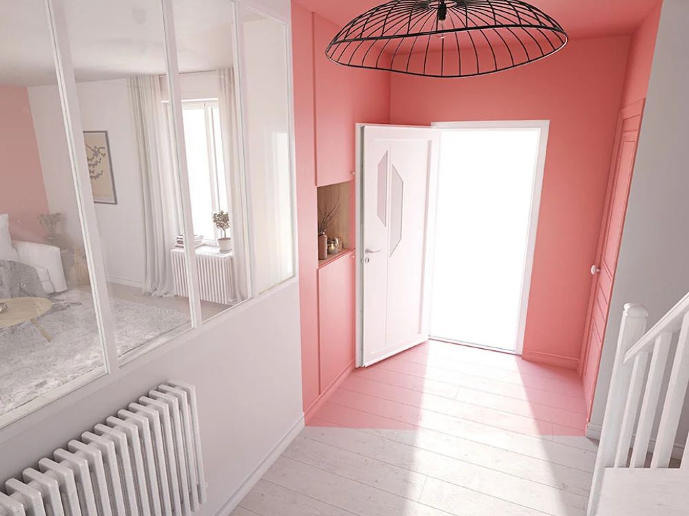 porte d'entrée en pvc ouverte sur une intérieur lumineux, blanc et rose